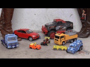 Cars And Trucks Crushed Under Buffalo Boots